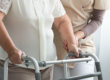 a woman helps an older woman by answering the question what is integrative assisted care
